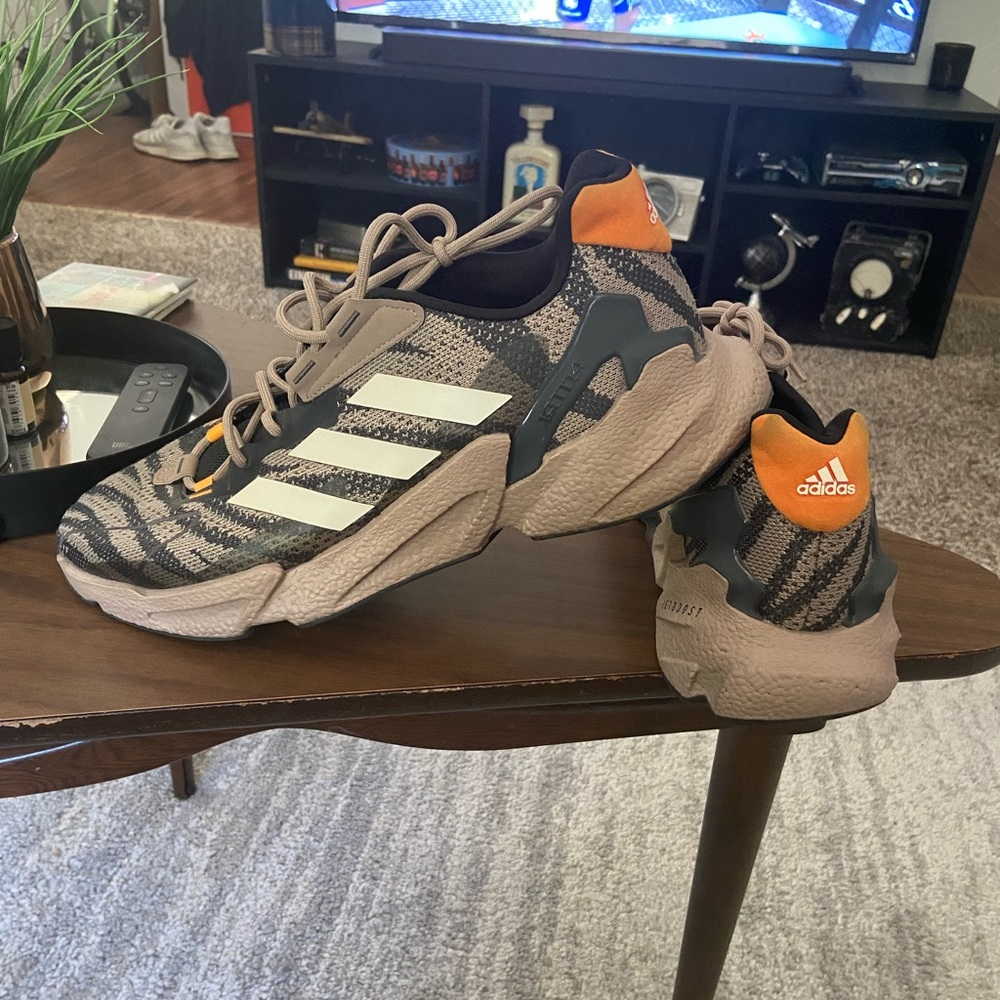 Adidas chalky brown Net BOOST running sneakers.